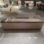 Luxury Coffee Table with Quilted Upholstered Panels Natural Wood Veneer Finish and Stainless Steel Accents